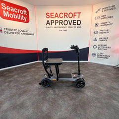 USED Lightweight Car Portable GoGo Mg2, Mobility Scooter 4mph, NEW BATTS