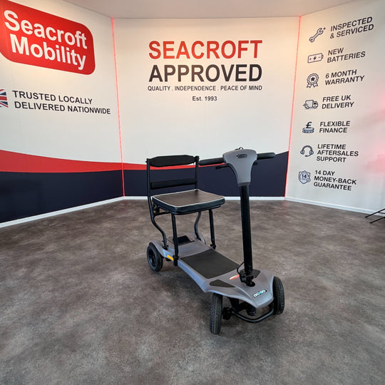 USED Lightweight Car Portable GoGo Mg2, Mobility Scooter 4mph, NEW BATTS